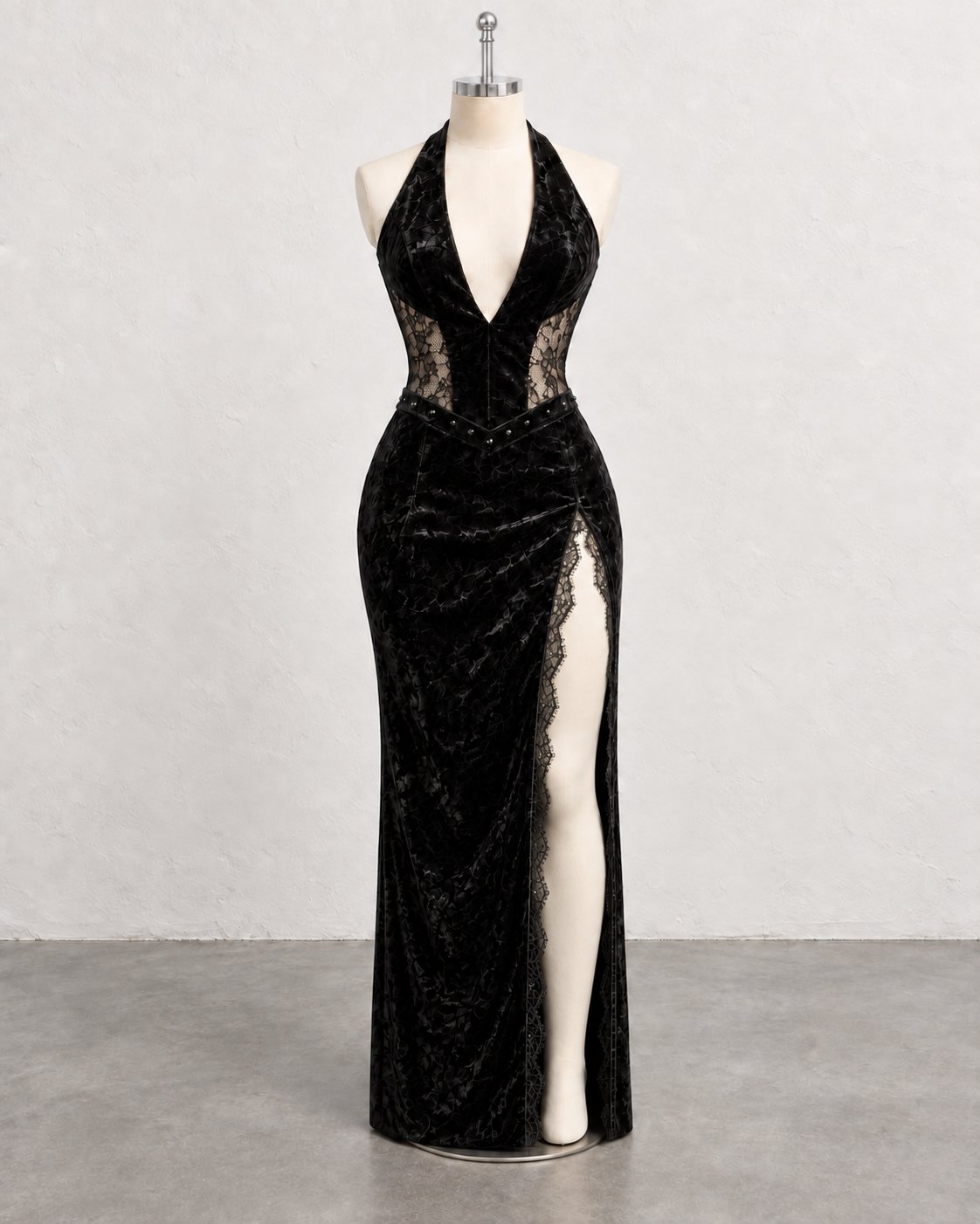 Gothic lace and velvet gown manufacturer — floor-length halter gown sample on mannequin, showing lace waist panel, stud trim and high side slit